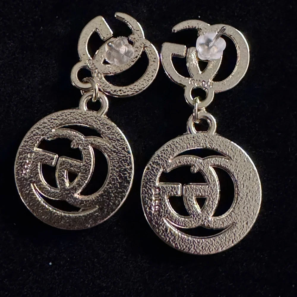 Gucci Gold and Silver GG Dangle Earrings - Picture 2 of 2